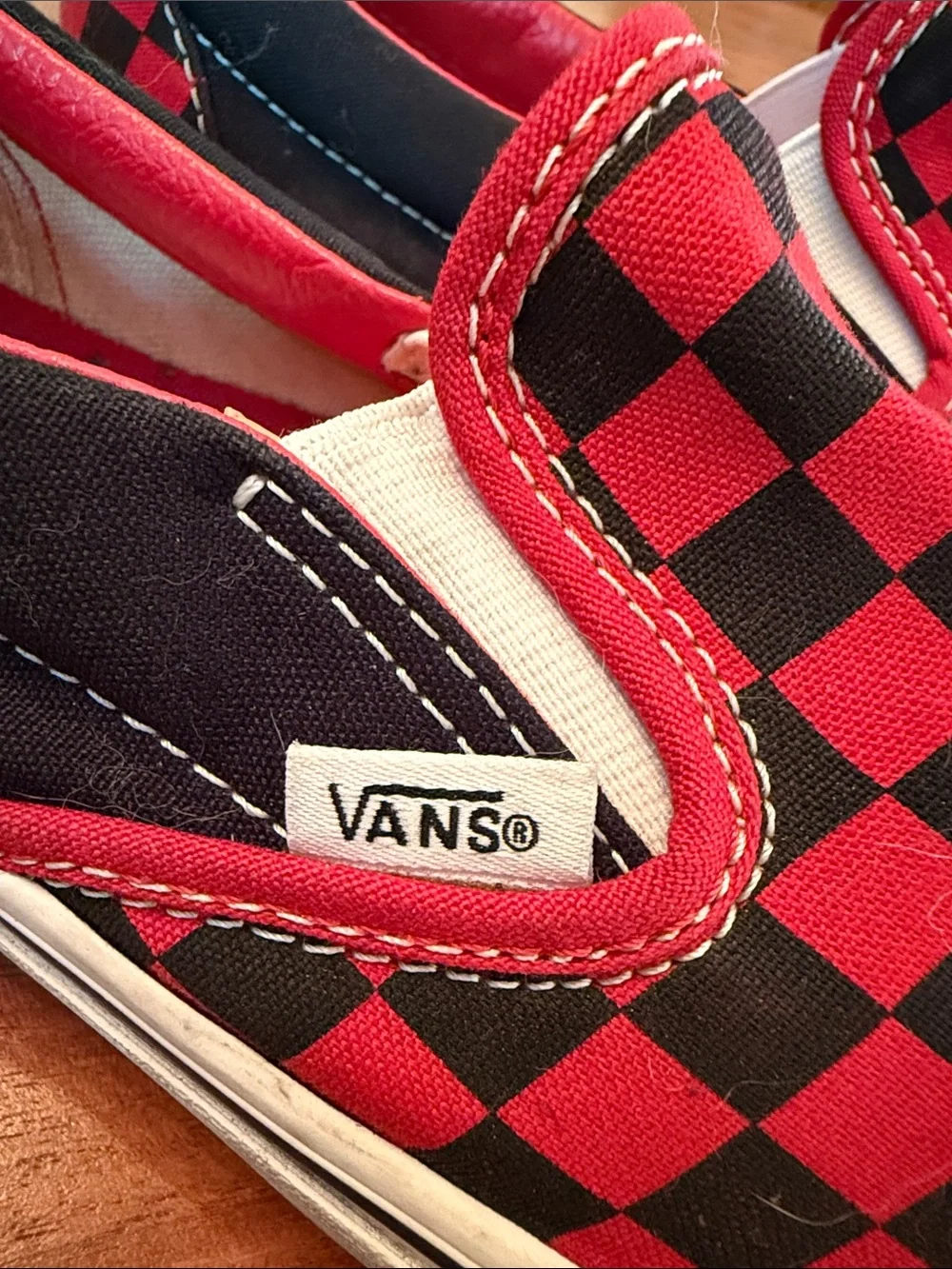 Classic red and black checkered Vans. Men’s 8.5